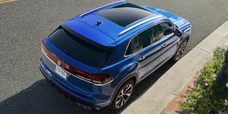 2026 Volkswagen Atlas Cross Sport blue exterior top view with panoramic sunroof